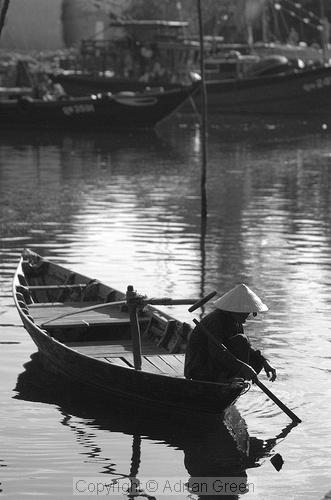 Vietnamese boatman in conical hat, Hoi An