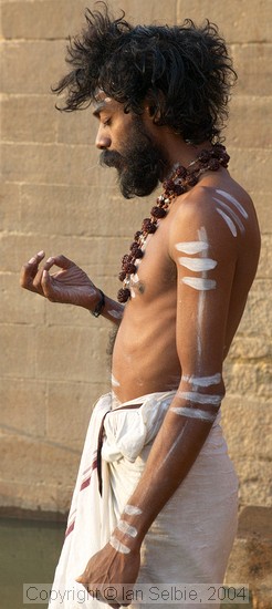 Meditating prior to bathing in the Ganges